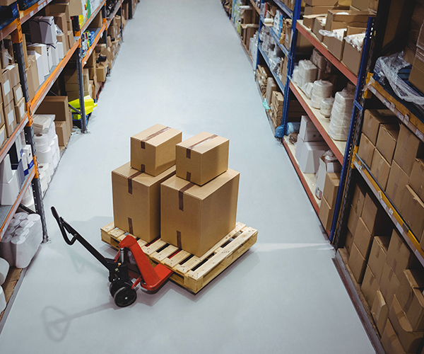 Items in warehouse with forklift moving products